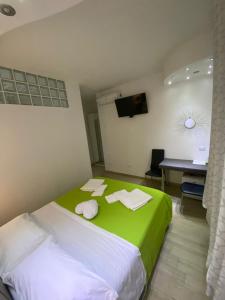Postel nebo postele na pokoji v ubytování Vapama Rooms