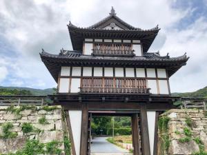 a large building with a balcony on top of it at Hotel Tsushima - Vacation STAY 64041v in Tsushima