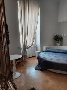 Posteľ alebo postele v izbe v ubytovaní Apartment Rome 18