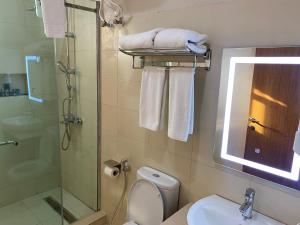 Koupelna v ubytování Wali's Suites