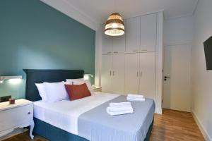 Posteľ alebo postele v izbe v ubytovaní NewVintage Apartment
