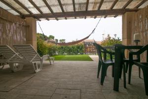 A balcony or terrace at Fattoria Palazzeta - Pet & Family Friendly