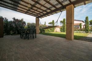 A garden outside Fattoria Palazzeta - Pet & Family Friendly