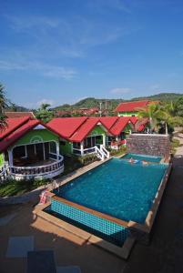 an overhead view of a swimming pool at a resort at Nature Beach Resort, Koh Lanta in Ko Lanta