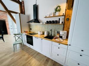 Köök või kööginurk majutusasutuses Baryczanka SLOW HOME