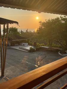a view of the sunset from the deck of a house at Punta Hills Montanita in Montañita