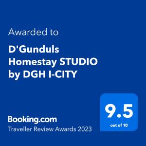 a blue sign with the text awarded to d guauld homesney studio by d at D'Gunduls Homestay STUDIO by DGH I-CITY in Shah Alam