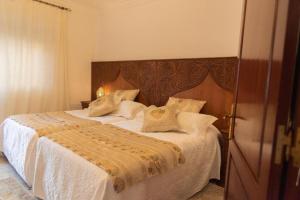 Postel nebo postele na pokoji v ubytování VILLA MATI Maison D'hôtes