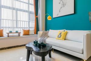 Posezení v ubytování Lavendar Duplex Apartment