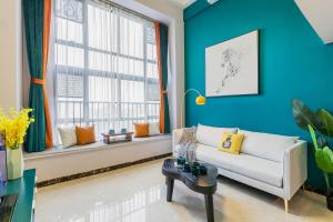 Posezení v ubytování Lavendar Duplex Apartment
