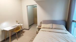 Ένα ή περισσότερα κρεβάτια σε δωμάτιο στο Uptown Parksuites BGC 2 bedroom 2 bath