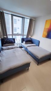 Ένα ή περισσότερα κρεβάτια σε δωμάτιο στο Uptown Parksuites BGC 2 bedroom 2 bath