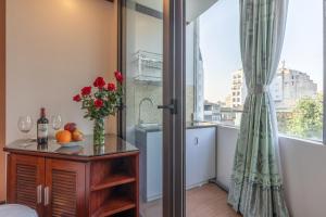 Una cocina o cocineta en T - Apartment