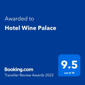 a blue sign that says awarded to a hotel wine palace at Hotel Wine Palace in Tbilisi City