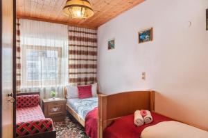 A bed or beds in a room at Ferienhaus Wechner