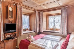 A bed or beds in a room at Ferienhaus Wechner