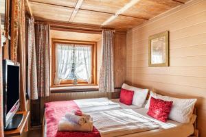 A bed or beds in a room at Ferienhaus Wechner