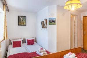 A bed or beds in a room at Ferienhaus Wechner