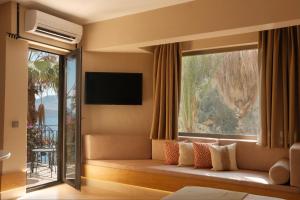 Телевизор и/или развлекательный центр в Villa Hotel Tamara