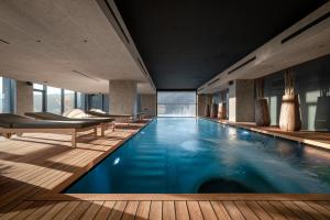 a large swimming pool in a hotel room at HAY boutique hotel & SPA by Edem Family in Bukovel