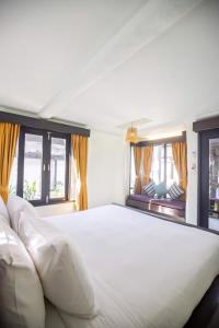 Postel nebo postele na pokoji v ubytování Punnpreeda Beach Resort - SHA Plus Certified