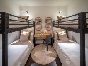 Ένα ή περισσότερα κρεβάτια σε δωμάτιο στο Chala At Nimman +21 φωτογραφίες