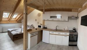 Apartmány Nová duha Vavřinec 주방 또는 간이 주방