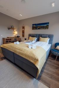 Postel nebo postele na pokoji v ubytování Lofoten Planet - Boutique Hotel