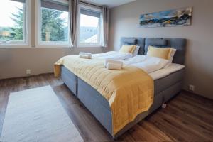 Postel nebo postele na pokoji v ubytování Lofoten Planet - Boutique Hotel