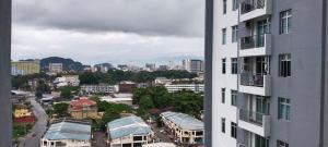 a view of a city from a building at HK Homestay in Ipoh