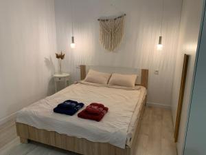 Кровать или кровати в номере Boho квартира у моря ЖК Парк Фонтанов