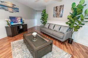 a living room with a couch and a coffee table at Beautiful Space all for you! in New Britain