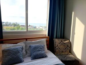 Voodi või voodid majutusasutuse Seaview Modern Studio toas +31 fotot