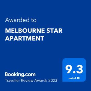a blue sign with the text awarded to melbourne star apartment at MELBOURNE STAR APARTMENT in Melbourne