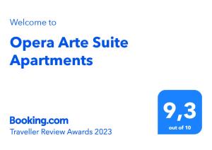 un cartello che dice appartamenti suite a tariffa aperta con piazza blu di Opera Arte Suite Apartments a Porto Recanati