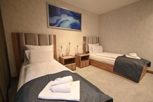 Posteľ alebo postele v izbe v ubytovaní Hotel Foldana