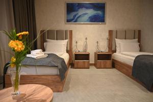 Posteľ alebo postele v izbe v ubytovaní Hotel Foldana