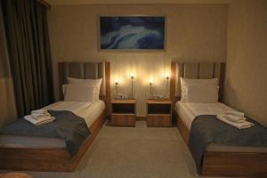 Posteľ alebo postele v izbe v ubytovaní Hotel Foldana