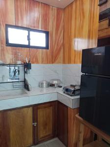 Kuchyň nebo kuchyňský kout v ubytování Woodland Inn