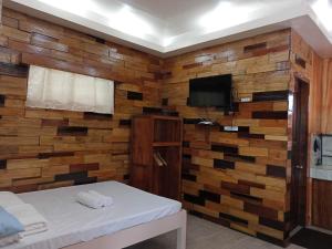 TV a/nebo společenská místnost v ubytování Woodland Inn