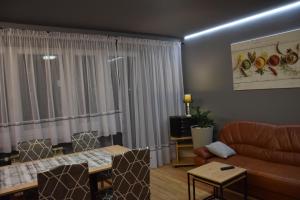 Posedenie v ubytovaní Apartament Julia 1-6 os II piętro z dwoma sypialniami