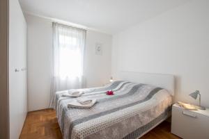 מיטה או מיטות בחדר ב-Apartments Faro