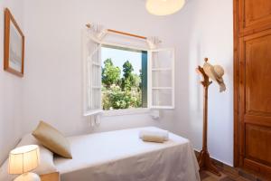 A bed or beds in a room at Villa La Martina
