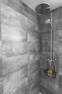 A bathroom at Stylish apartments with balcony & parking near the beach by REMS