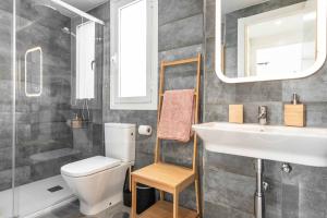 A bathroom at Stylish apartments with balcony & parking near the beach by REMS