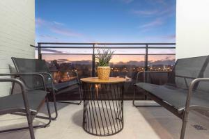A balcony or terrace at Stylish apartments with balcony & parking near the beach by REMS