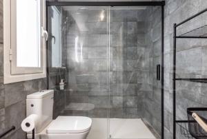 A bathroom at Stylish apartments with balcony & parking near the beach by REMS
