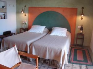 Postel nebo postele na pokoji v ubytování La Casa Grande