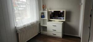 A television and/or entertainment centre at ApartmentMR