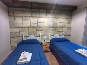 Posteľ alebo postele v izbe v ubytovaní Cazorla Paraíso Resort
